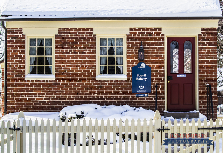 snow covered roof top on scovil bakery in historic nauvoo