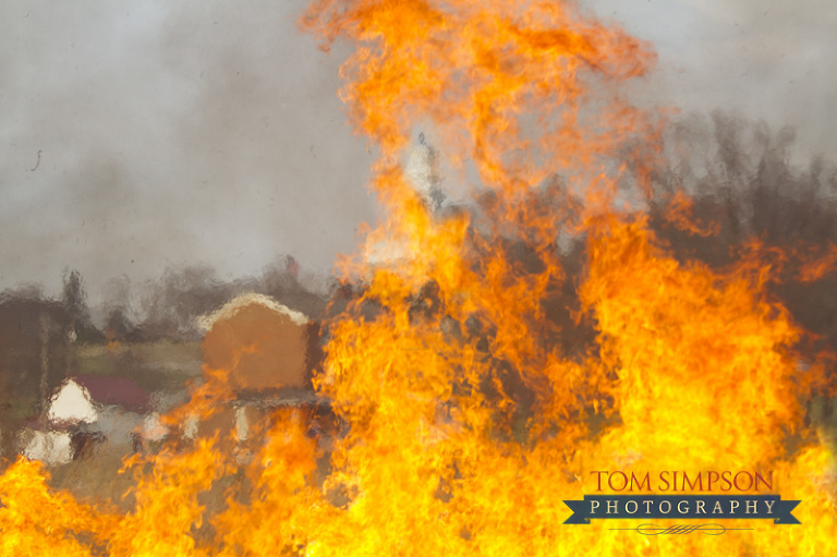 nauvoo temple seen through praire fire demonstration flames