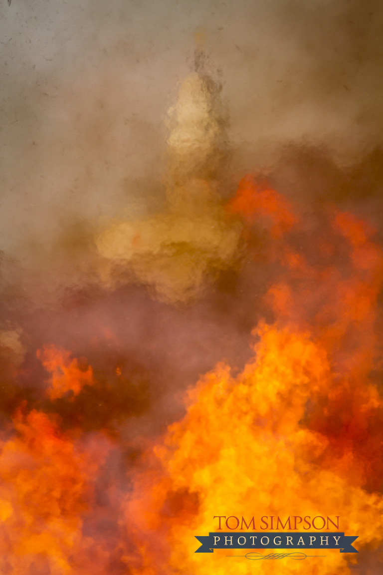 nauvoo temple seen through praire fire demonstration flames