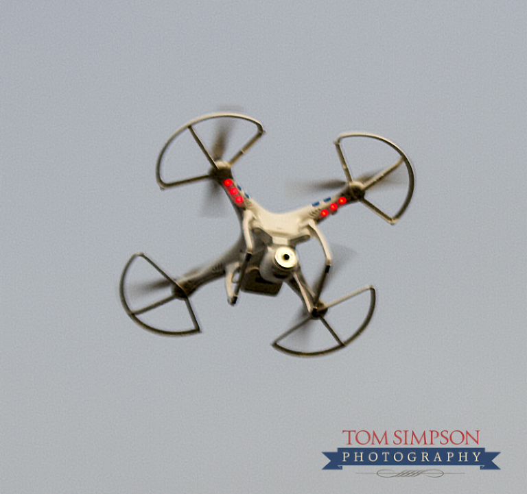 aerial camera flies over prairie fire demonstration area