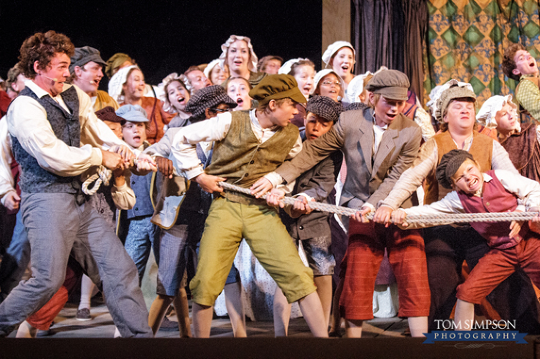 cute kids tug of war in british pageant in nauvoo