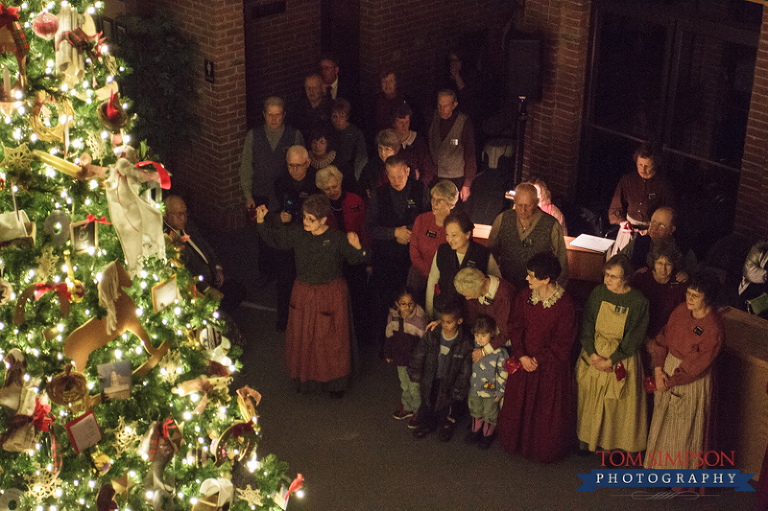 missionaries lead singing at tree lighting program